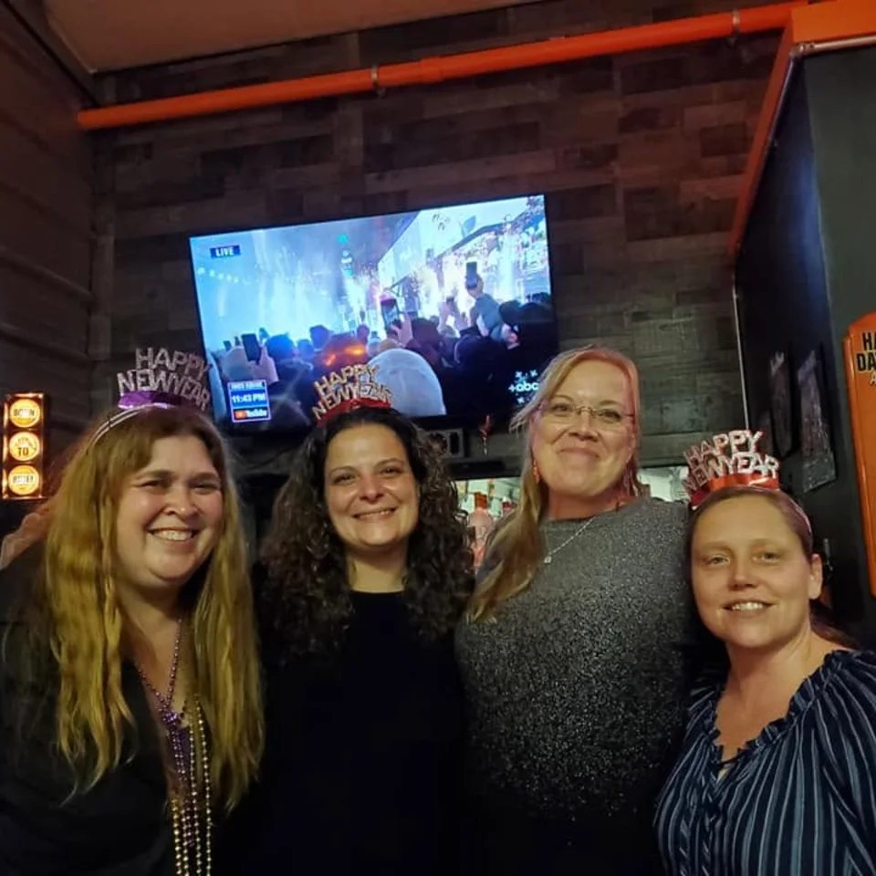Deb Dennis celebrating New Year’s Eve with three friends