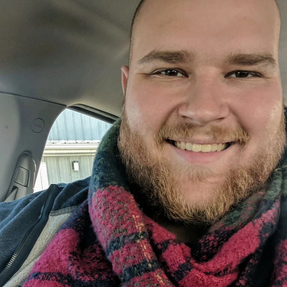Dillon Chase smiling in a close-up portrait