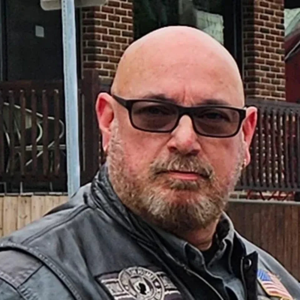 Rob Martinez, Assistant Director of ALR Post 259, in his leather vest outside the Post